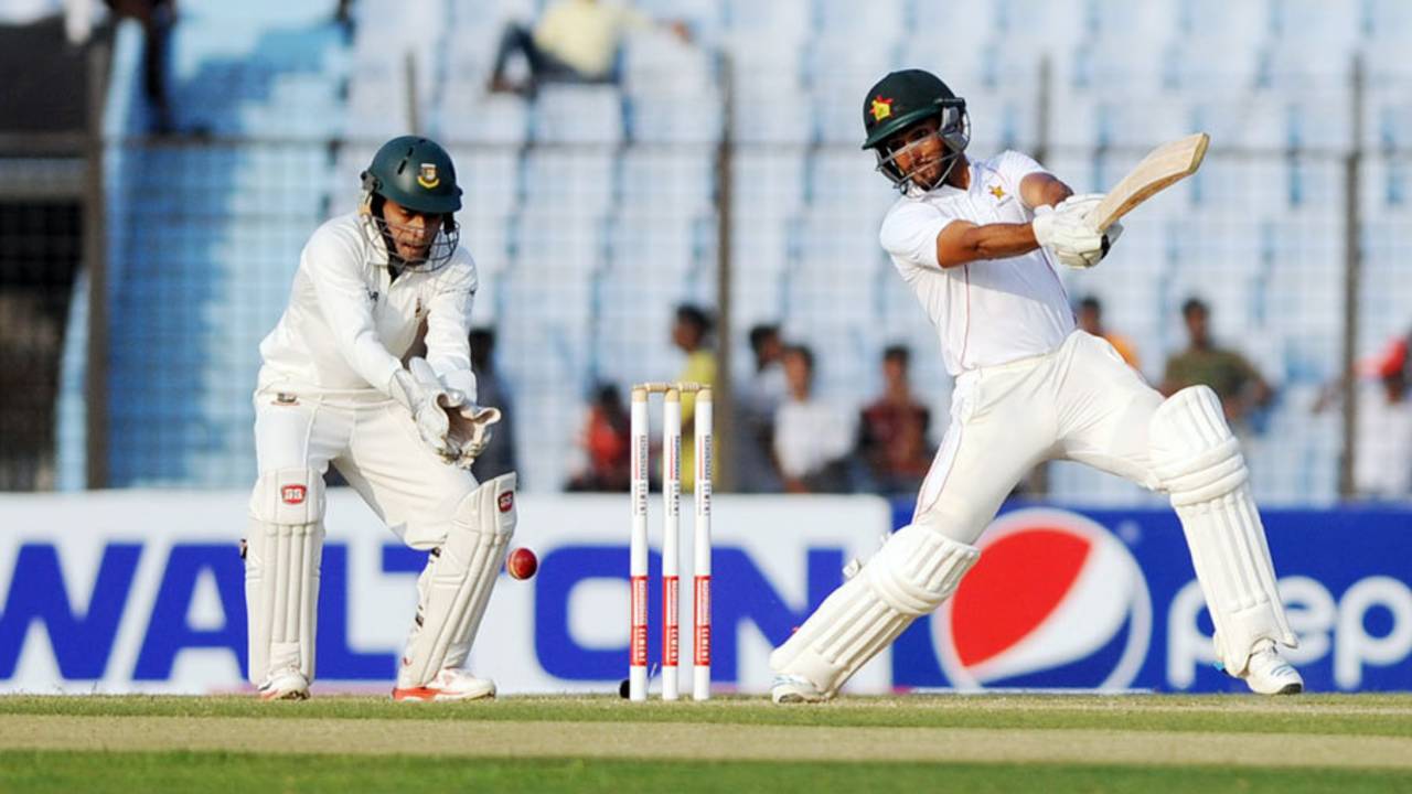 Sikandar Raza cuts on his way to fifty, Bangladesh v Zimbabwe, 3rd Test, 2nd day, Chittagong, November 13, 2014