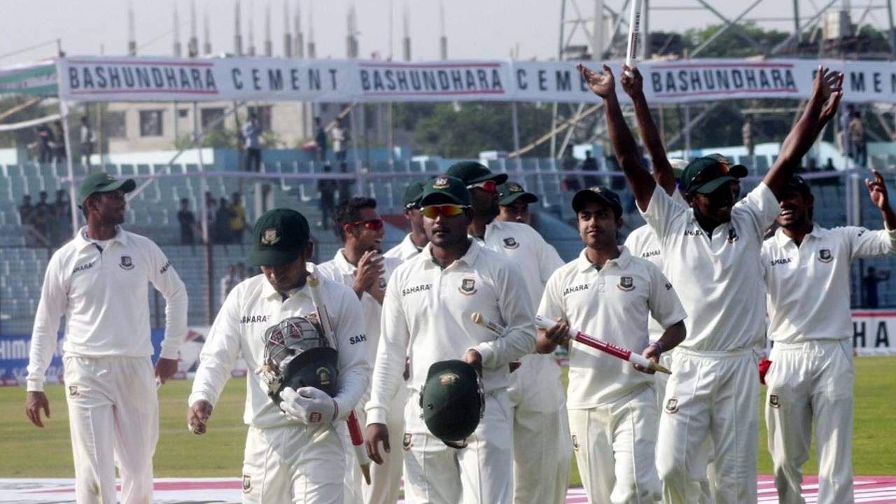 Bangladesh players walk back after a 186-run win, Bangladesh v Zimbabwe, 3rd Test, Chittagong, 5th day, November 16, 2014