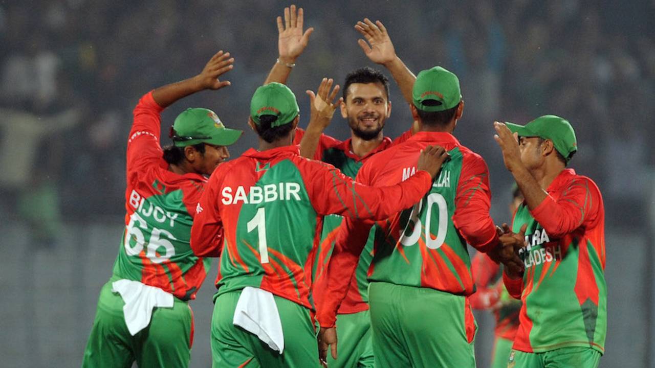 Mashrafe Mortaza is congratulated by team-mates after a wicket , Bangladesh v Zimbabwe, 2nd ODI, Chittagong, November 23, 2014