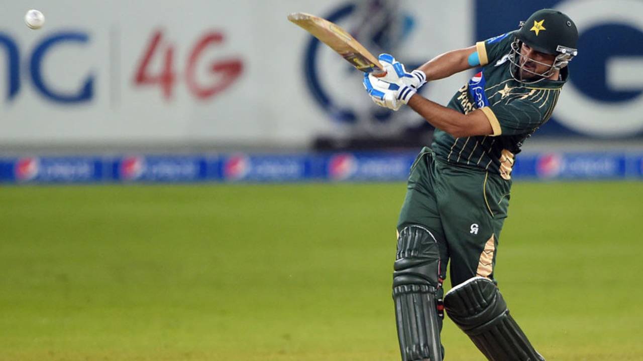 Awais Zia slams the ball down the ground, Pakistan v New Zealand, 1st T20, Dubai, December 4, 2014