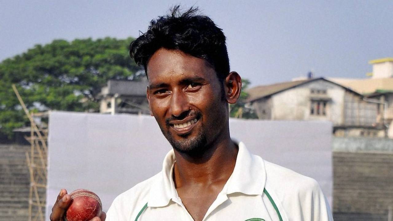 Krishna Das is all smiles after taking seven wickets, Assam v Tripura, Ranji Trophy, Group C, Guwahati, 3rd day, December 9, 2014