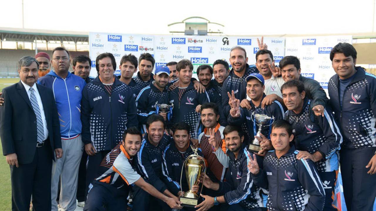 The Sui Northern Gas Pipelines Limited players celebrate with the QeEA Gold League trophy&nbsp;&nbsp;&bull;&nbsp;&nbsp;PCB