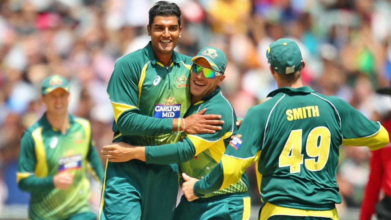 Gurinder Sandhu celebrates after taking his first ODI wicket, Australia v India, Carlton Mid Tri-series, Melbourne, January 18, 2015