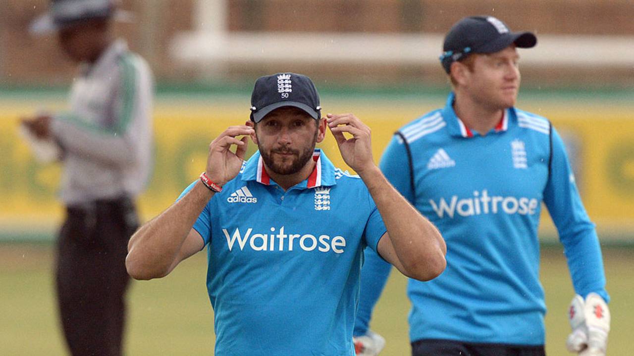 Tim Bresnan leaves the field as rain falls, South Africa A v England Lions, 3rd one-dayer, Potchefstroom, January 31, 2015