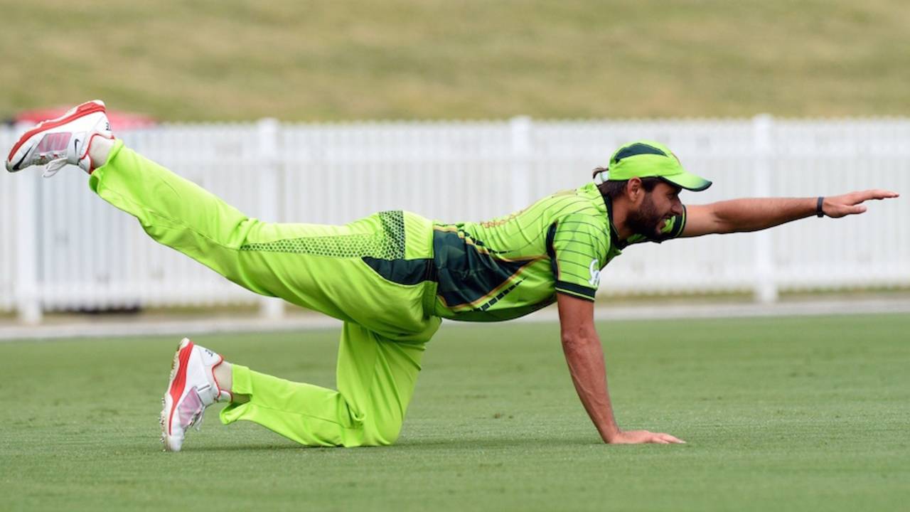 Take off: Shahid Afridi stretches while fielding, Bangladesh v Pakistan, World Cup warm-ups, Sydney, February 9, 2015