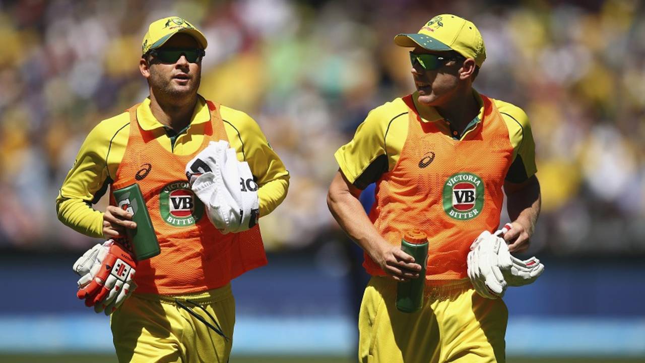 Michael Clarke and James Faulkner help out with the drinks, Australia v England, Group A, World Cup 2015, Melbourne, February 14, 2015