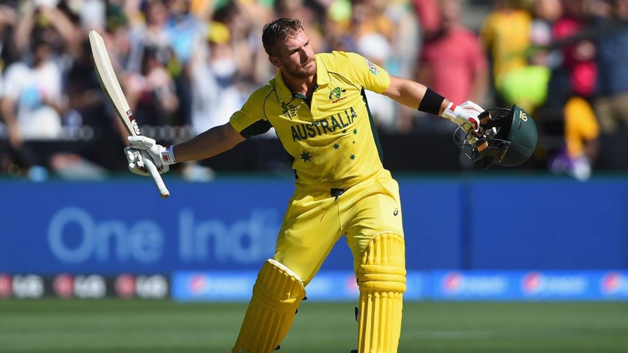 Aaron Finch celebrates after becoming the first centurion of World Cup 2015, Australia v England, Group A, World Cup 2015, Melbourne, February 14, 2015