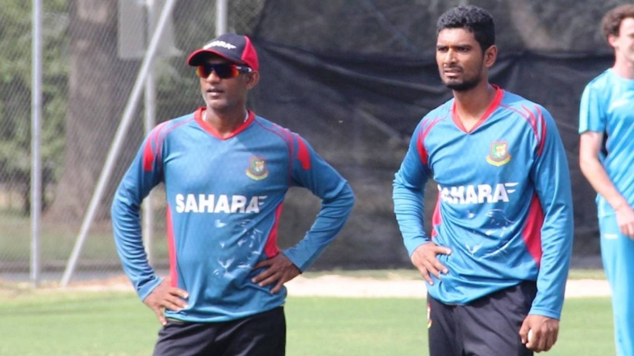 Mahmudullah and Ruwan Kalpage watch the Bangladesh players practice, World Cup 2015, Canberra, February 16, 2015