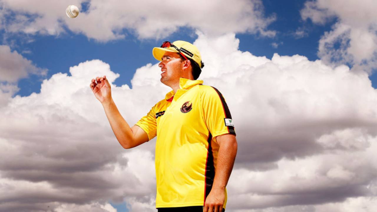 Michael Bailey of Western Australia poses for a photo after taking five wickets against Northern Territory in their Imparja Cup match, Alice Springs, February 11, 2014