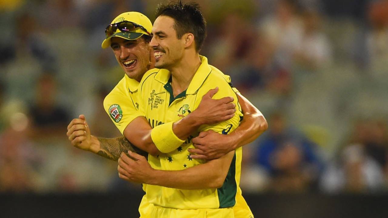 Mitchell Starc congratulates Mitchell Johnson after the latter took a wicket, Australia v England, Group A, World Cup 2015, Melbourne, February 14, 2015