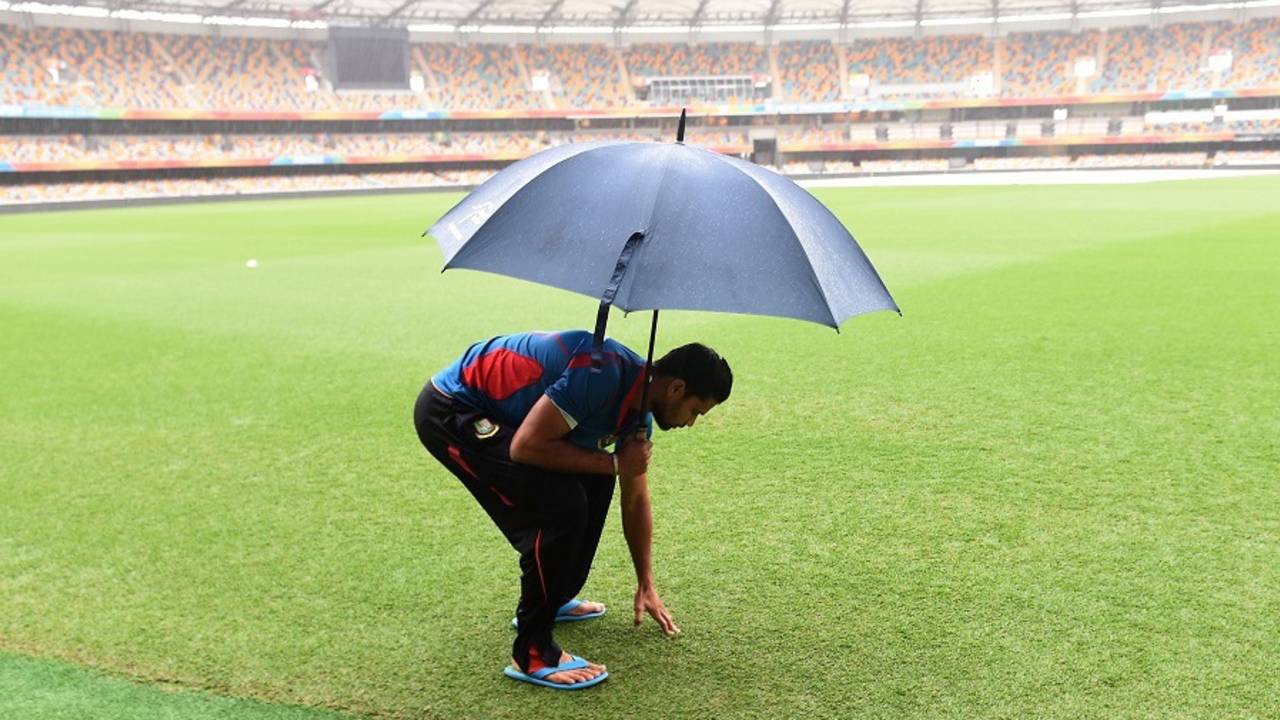Mashrafe Mortaza inspects the outfield at the Gabba on Friday&nbsp;&nbsp;&bull;&nbsp;&nbsp;AFP