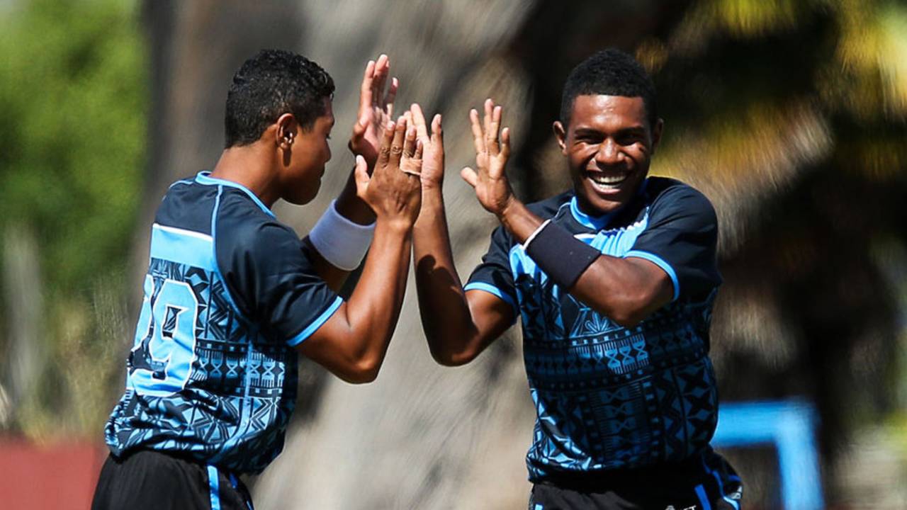Delaimatuku Maraiwaia (left) and Josaia Baleicikoibia celebrate a wicket for Fiji, Fiji v Samoa, EAP U-19 Trophy, Blenheim, February 27, 2015