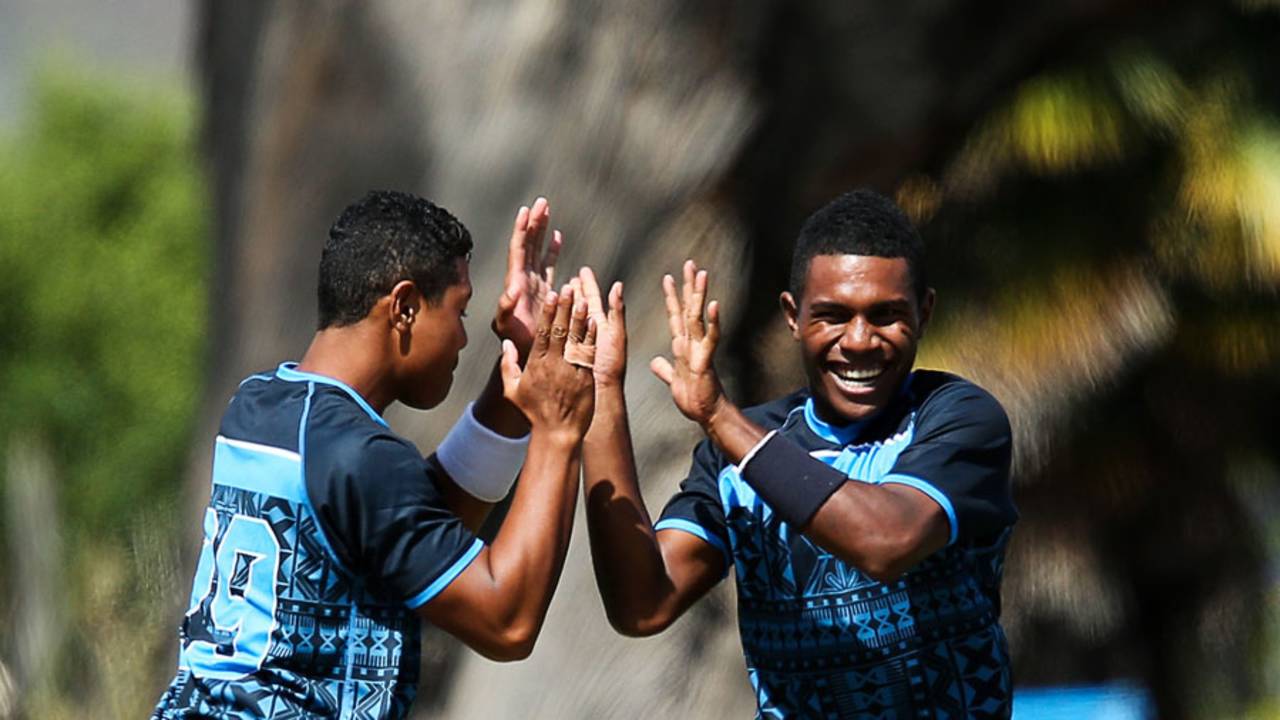 Delaimatuku Maraiwaia (left) and Josaia Baleicikoibia celebrate a wicket for Fiji