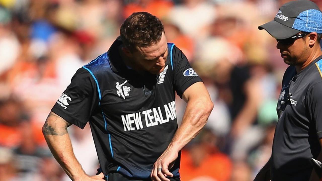 Brendon McCullum looks at his arm after he was hit by a short delivery from Mitchell Johnson&nbsp;&nbsp;&bull;&nbsp;&nbsp;Getty Images