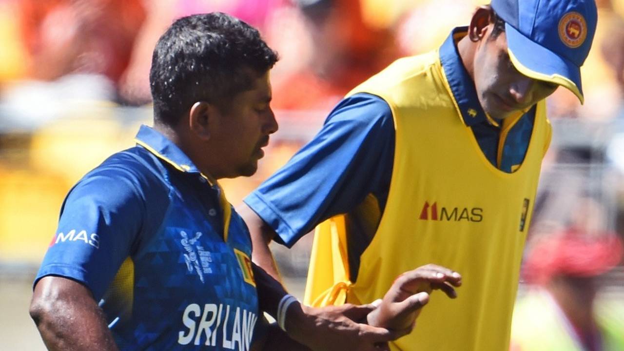 Rangana Herath split his spinning finger while trying to take a return chance against England on Sunday&nbsp;&nbsp;&bull;&nbsp;&nbsp;AFP