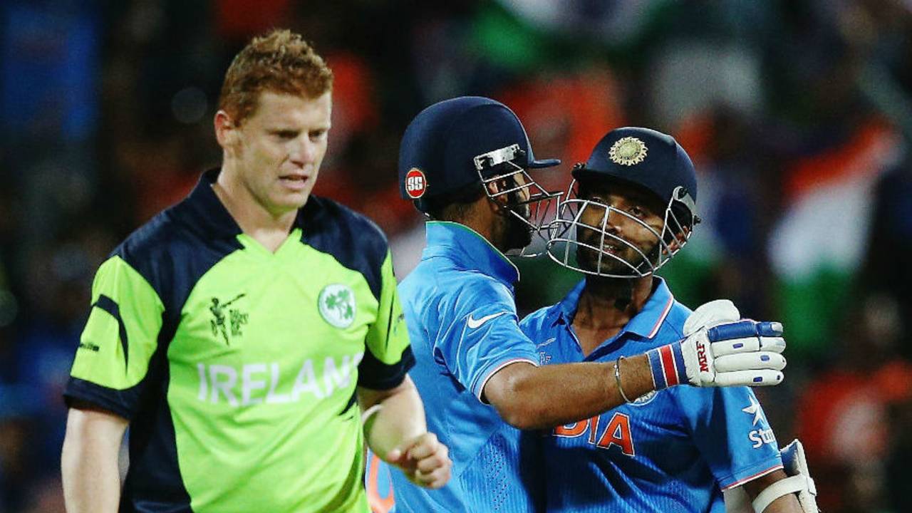 Virat Kohli and Ajinkya Rahane celebrate after hitting the winnings runs, India v Ireland, World Cup 2015, Group B, Hamilton, March 10, 2015