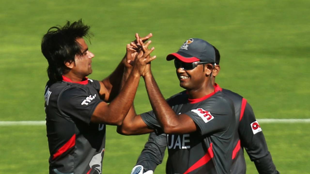 Kamran Shazad is congratulated after he dismissed AB de Villiers, South Africa v United Arab Emirates, World Cup 2015, Group B, Wellington, March 12, 2015
