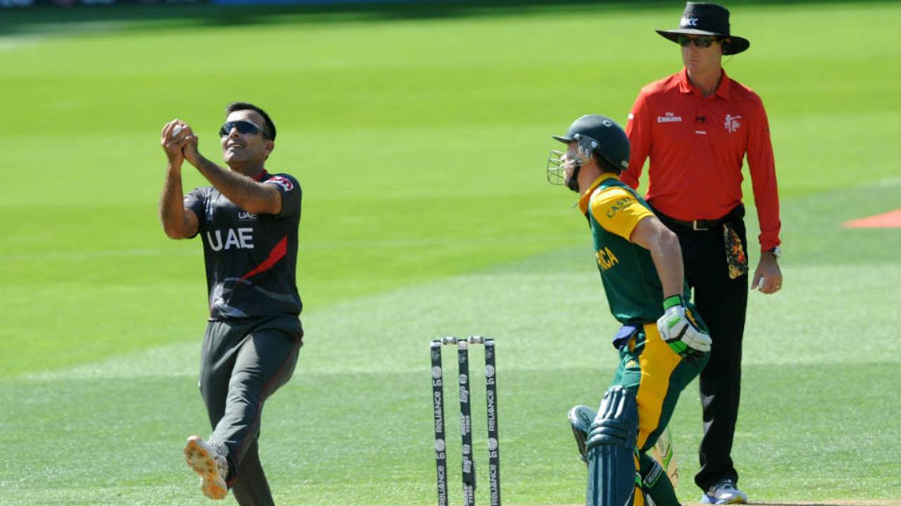Mohhamad Tauqir takes a return catch to dismiss Rilee Rossouw, South Africa v United Arab Emirates, World Cup 2015, Group B, Wellington, March 12, 2015
