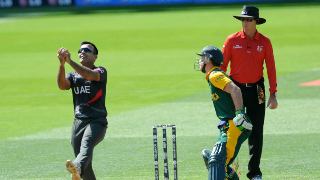 Mohhamad Tauqir takes a return catch to dismiss Rilee Rossouw, South Africa v United Arab Emirates, World Cup 2015, Group B, Wellington, March 12, 2015