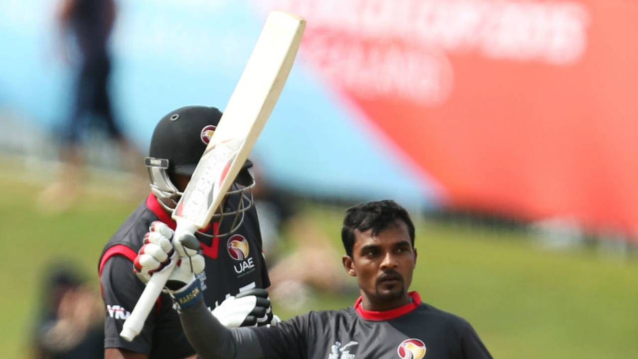 Nasir Aziz raises his bat after getting his maiden ODI fifty