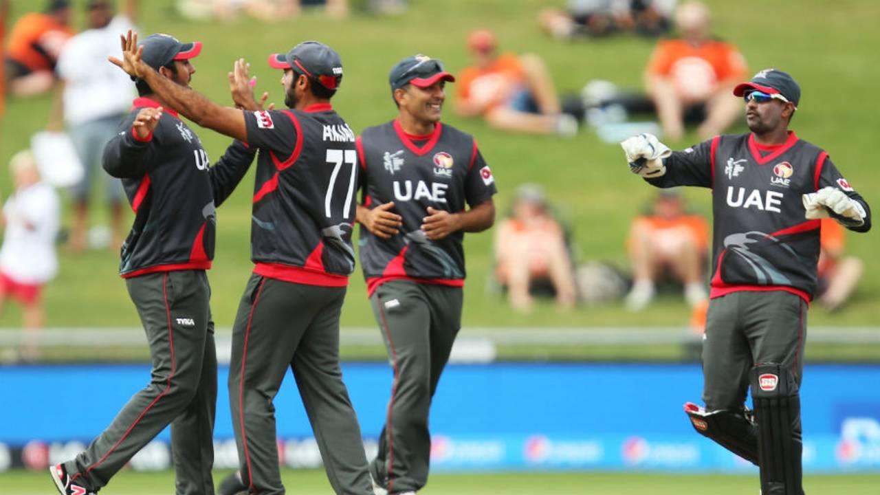 UAE players celebrate the fall of a wicket, United Arab Emirates v West Indies, World Cup 2015, Group B, Napier, March 15, 2015