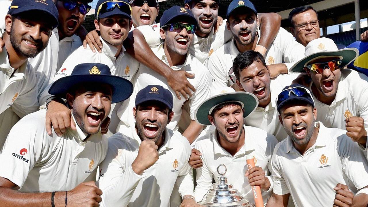 The Karnataka players celebrate after retaining the Irani Cup, Karnataka v Rest of India, Irani Cup 2014-15, 4th day, Bangalore, March 20, 2015