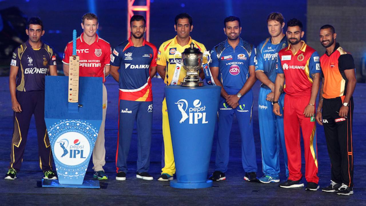 The captains pose with the trophy at the opening ceremony, IPL 2015, Kolkata, April 7, 2015
