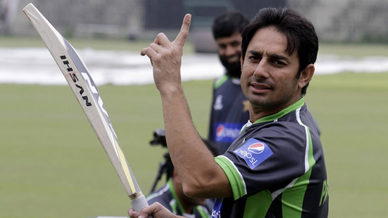 Saeed Ajmal gestures on the sidelines of a practice session&nbsp;&nbsp;&bull;&nbsp;&nbsp;Associated Press