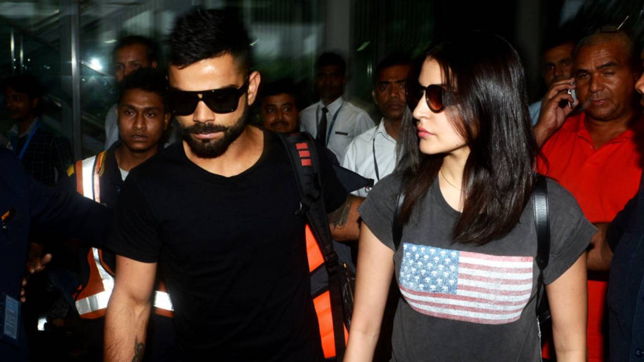 Virat Kohli and Anushka Sharma arrive at the Kolkata airport, April 6, 2015