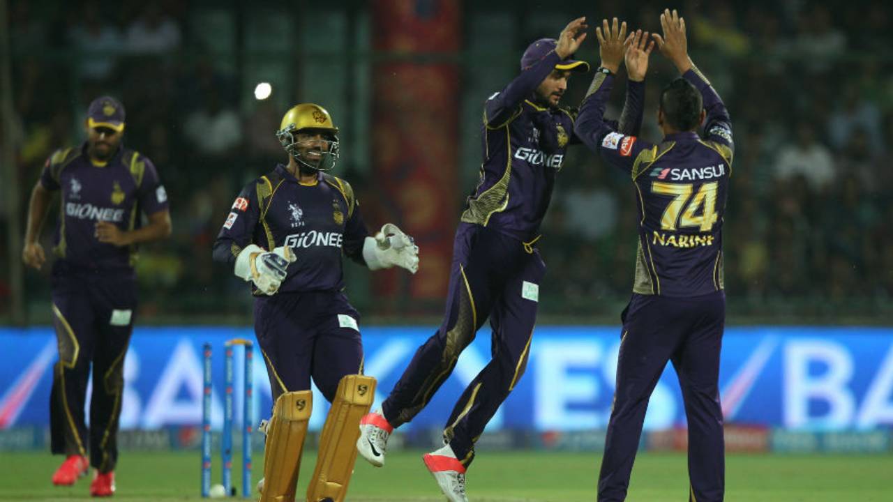 Sunil Narine celebrates a wicket with Manish Pandey, Delhi Daredevils v Kolkata Knight Riders, IPL 2015, Delhi, April 20, 2015