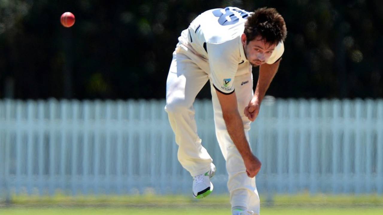 Ian Holland sends down a delivery, Queensland v Victoria, Futures League, Brisbane, October 1, 2013