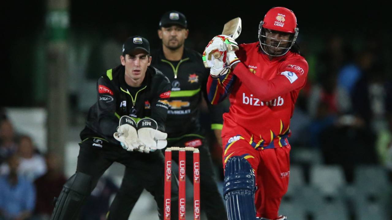 Craig Kieswetter looks on as Chris Gayle hits one down the ground,  Warriors v Lions, Ram Slam T20 Challenge, East London, November 7, 2014 