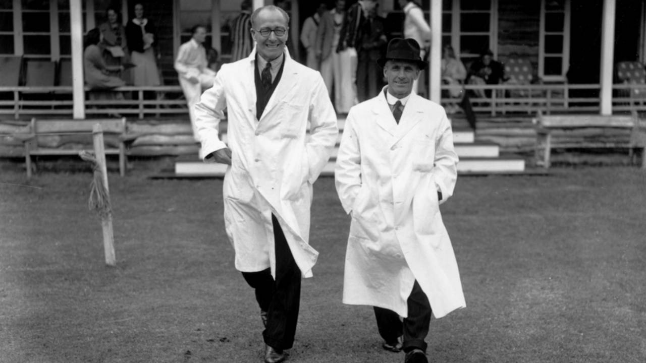 Umpires Andy Ducat and Bert Strudwick stride out for a charity match, Rudgwick, June 19, 1939