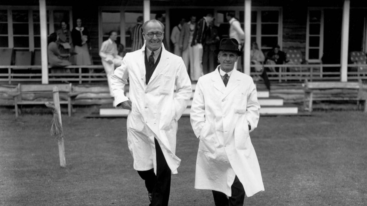 Umpires Andy Ducat and Bert Strudwick stride out for a charity match, Rudgwick, June 19, 1939