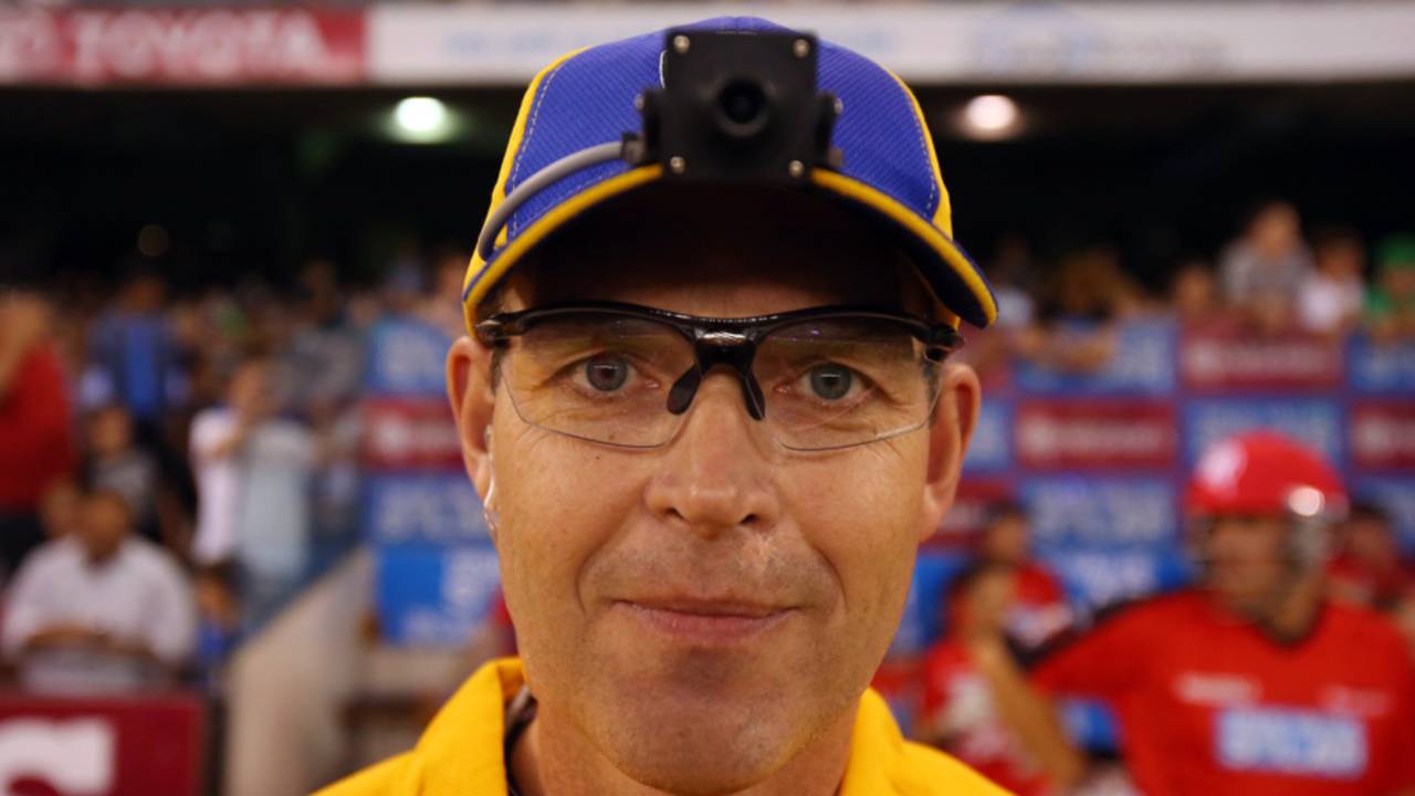 Umpire Simon Fry models the umpire cam, Melbourne Renegades v Melbourne Stars, BBL, Docklands Stadium, Melbourne, December 7, 2012