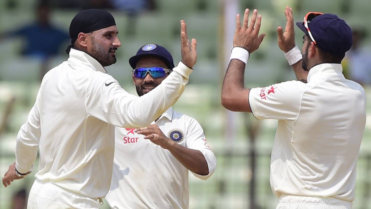 Harbhajan Singh crossed Wasim Akram's tally of 414 Test wickets when he had Imrul Kayes stumped, Bangladesh v India, only Test, 4th day, Fatullah, June 13, 2015