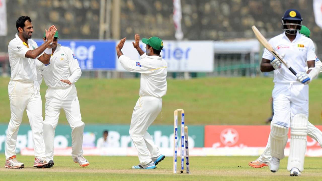 Wahab Riaz celebrates after bowling Angelo Mathews, Sri Lanka v Pakistan, 1st Test, Galle, 2nd day, June 19, 2015