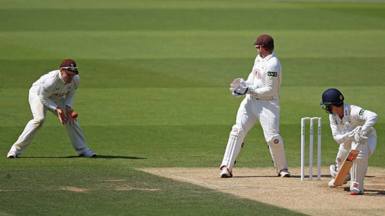 Jason Roy pouches a catch at slip to remove Will Tavare, Surrey v Gloucestershire, County Championship, Division Two, Kia Oval, 3rd day, June 29, 2015