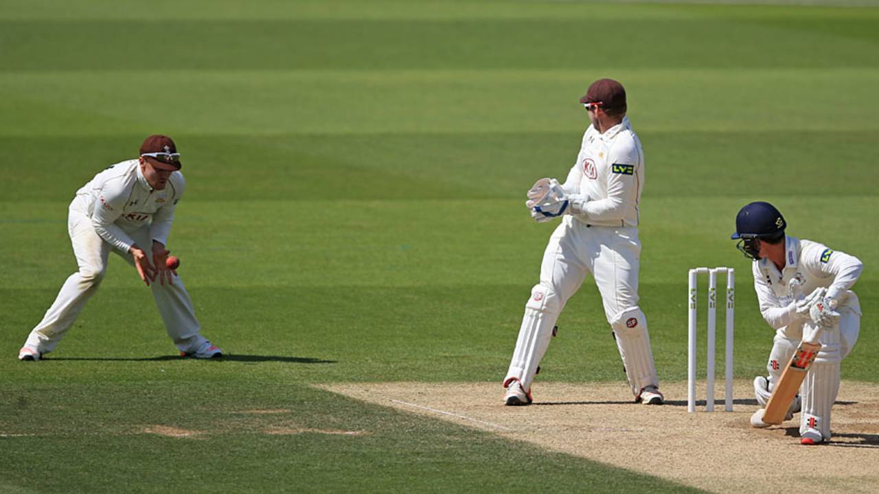 Jason Roy pouches a catch at slip to remove Will Tavare, Surrey v Gloucestershire, County Championship, Division Two, Kia Oval, 3rd day, June 29, 2015
