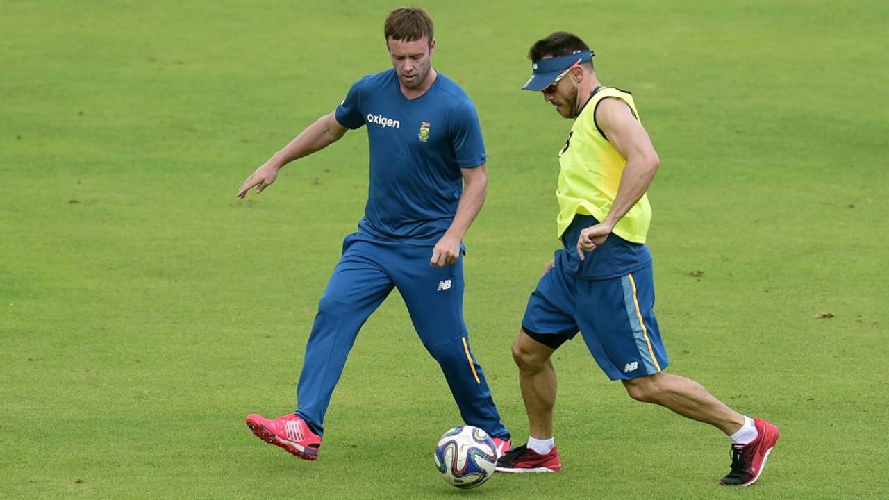 AB de Villiers and Faf du Plessis enjoy a spot of football during South Africa's training, Dhaka, July 1, 2015