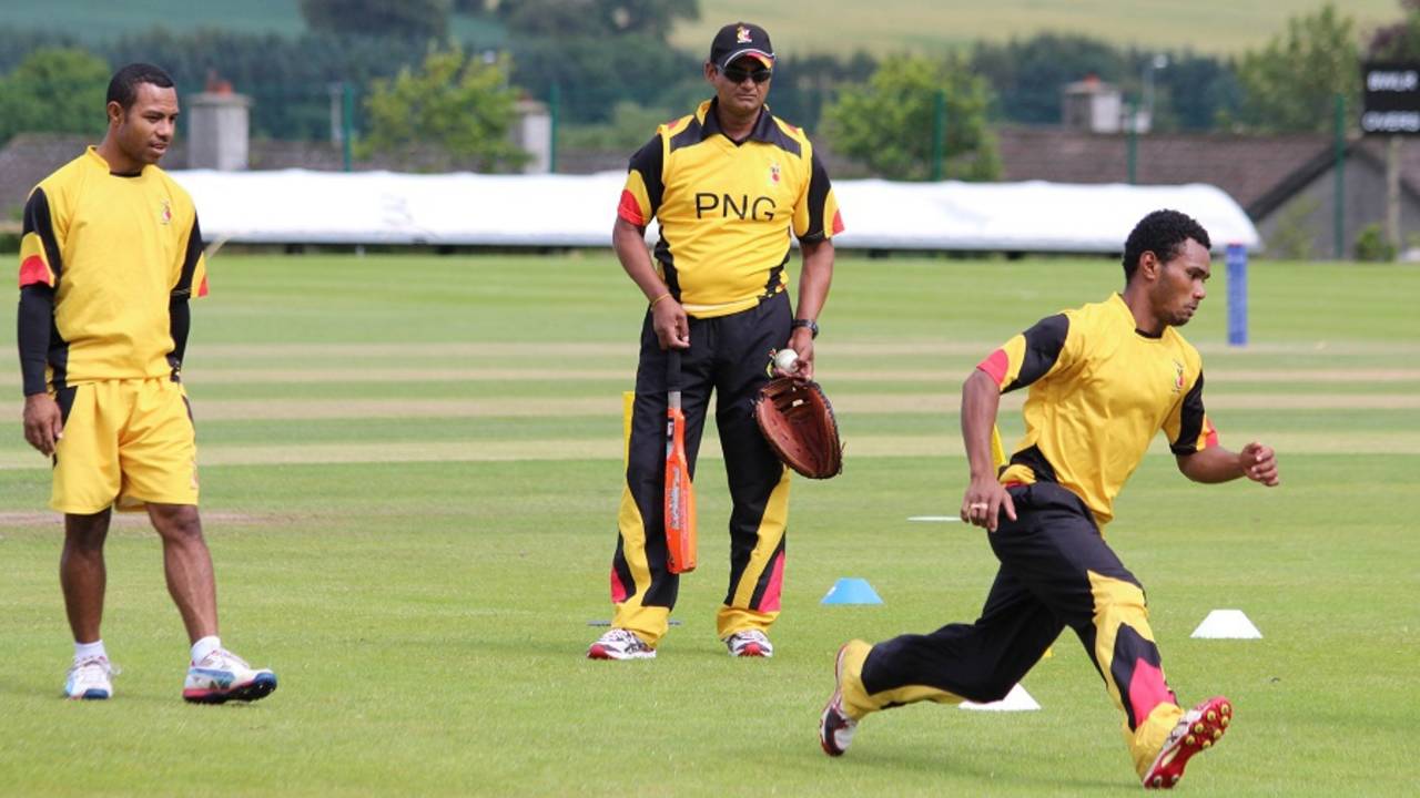 Dipak Patel supervises slide practice, Bready Cricket Club, July 8, 2015