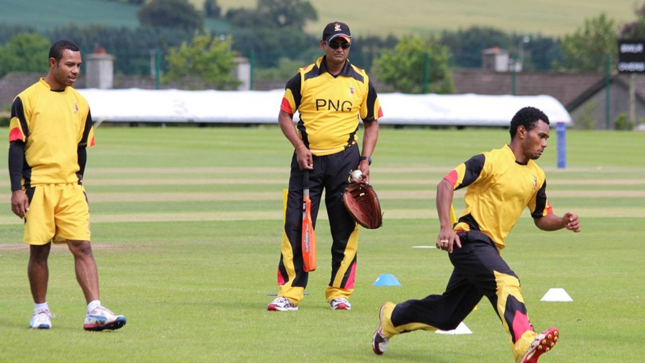 Dipak Patel supervises slide practice, Bready Cricket Club, July 8, 2015