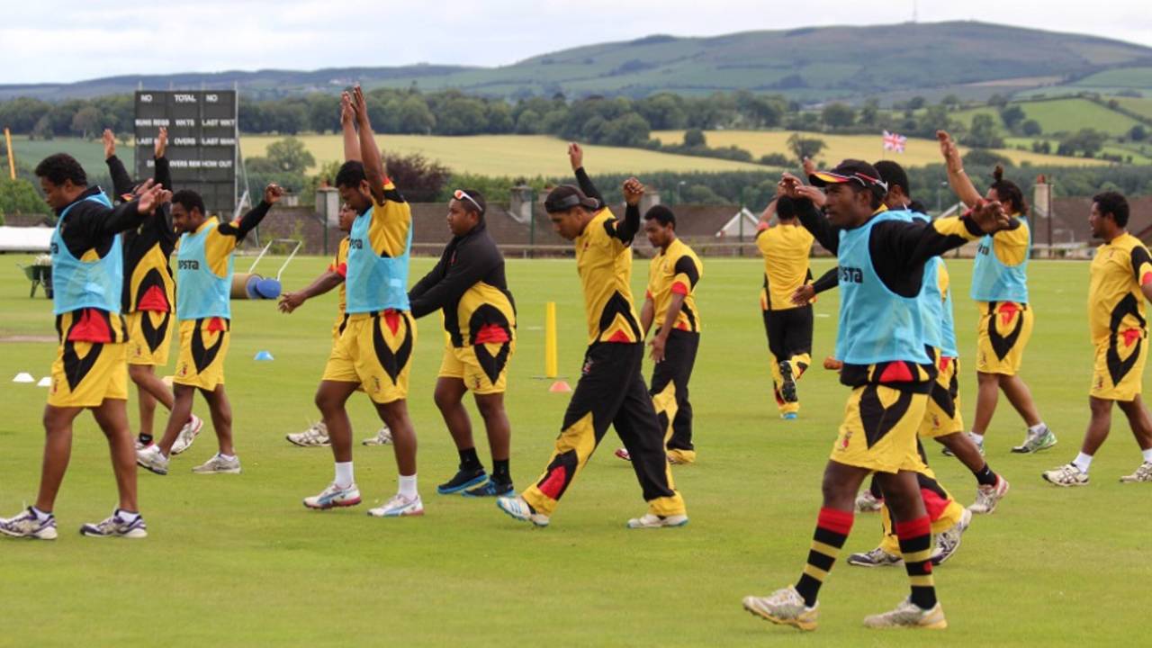  Papua New Guinea players during a warm-up session, Bready Cricket Club, July 8, 2015