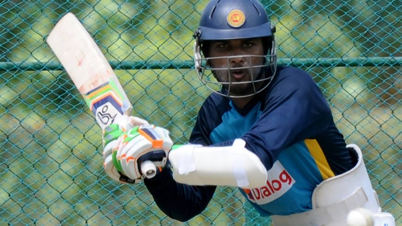 Dinesh Chandimal has a hit during Sri Lanka's practice, Dambulla, July 10, 2015