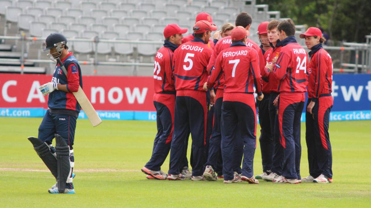 The Jersey players celebrate the dismissal of Binod Bhandari, Jersey v Nepal, World T20 Qualifier, July 18, 2015