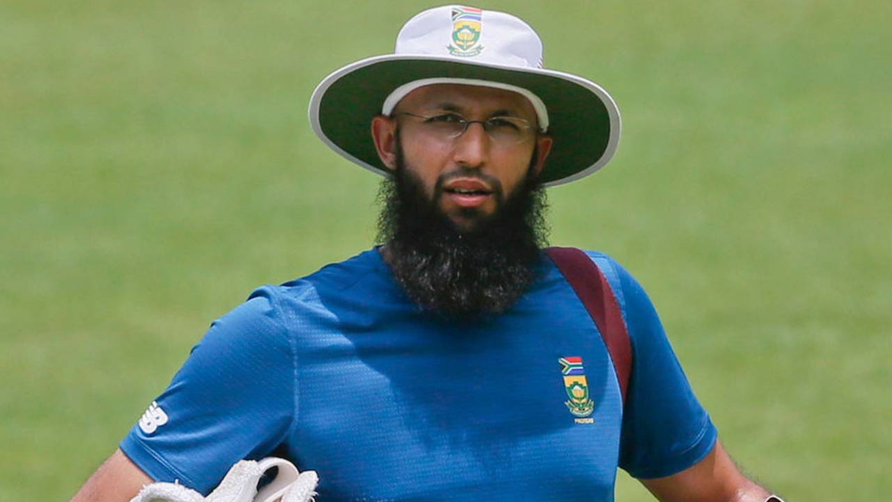 Hashim Amla carries his equipment during a training session, Dhaka, July 28, 2015
