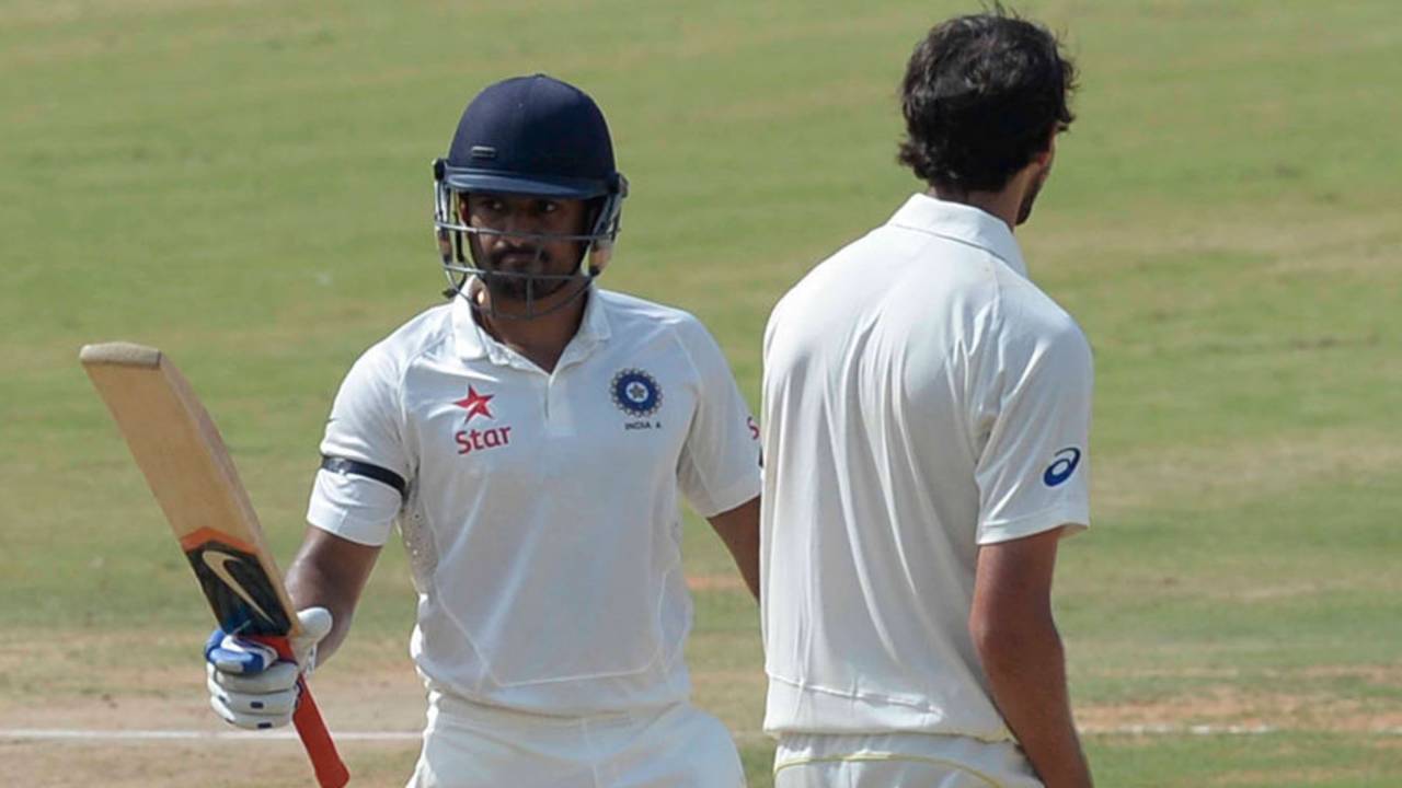 Karun Nair raises his bat after completing his half-century, India A v Australia A, 2nd unofficial Test, Chennai, 1st day, July 29, 2015 