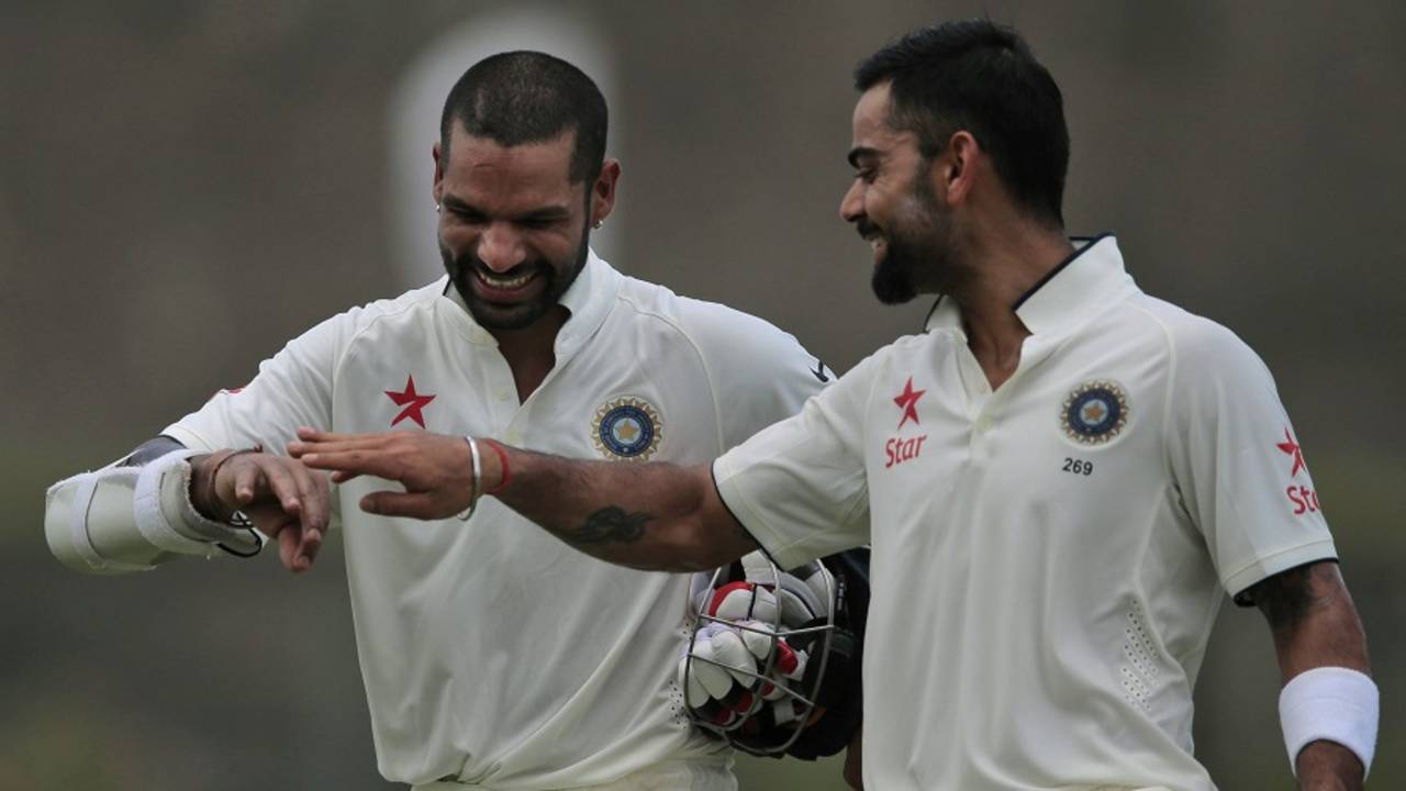 Shikhar Dhawan and Virat Kohli share a lighter moment, Sri Lanka v India, 1st Test, Galle, 2nd day, August 13, 2015