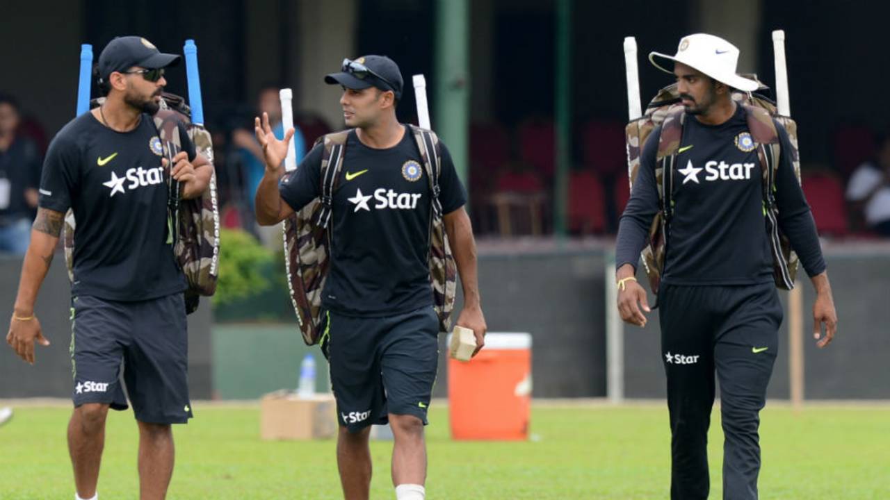 All guns loaded: M Vijay, Stuart Binny and KL Rahul arrive at a training session, Colombo, August 18, 2015 