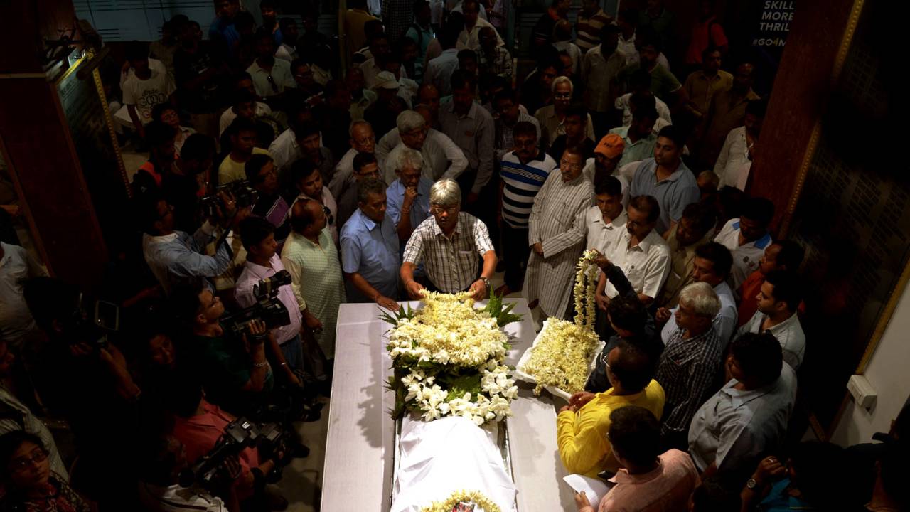 Mourners gather around the body of Ankit Keshri